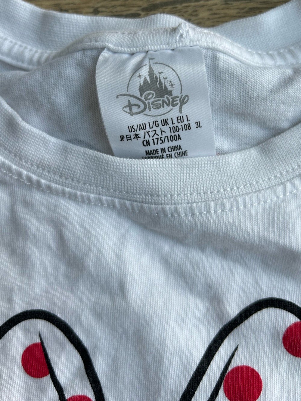 Disney White Minnie Mouse Tee with Black Polka Dot Puff Sleeves and Red Bow - Picture 4 of 4